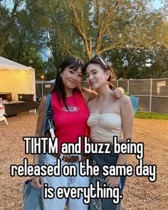 two women standing next to each other with the caption thm and buzz being released on the same day is everything