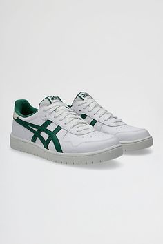 Walk out in the JAPAN S men's heritage-inspired sportstyle shoe by the ASICSTIGER™ brand. Made with a mix of smooth leather and available in monochrome colors, the clean good looks of this shoe will take you from the office to the street in style and comfort. UPPER MATERIAL Man Made Materials CARE Spot or Wipe Clean Imported | ASICS Japan S Sneaker in White/Jasper Green at Urban Outfitters Japan Shoes, Asics Japan S, Mens Shoes Casual, White Jasper, Mens Volleyball, Shoe Technology, Men's Shoes Accessories, Asics Sneakers, Monochrome Color