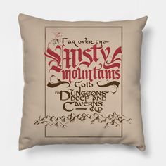 a pillow with the words for one of the misty mountains written in red on it