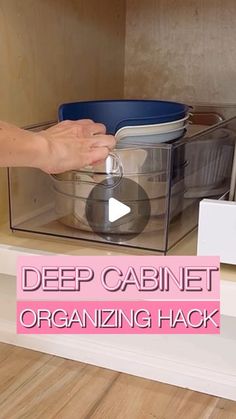 a video demonstrating how to organize a deep cabinet for organizing hacks and organization tips