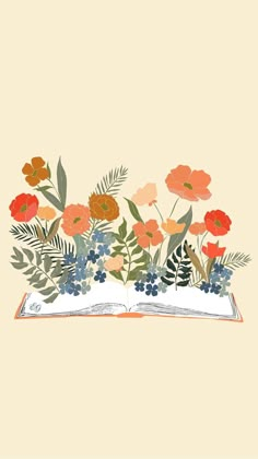 an open book with flowers on it