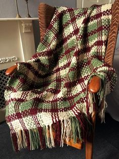 a chair with a blanket on top of it