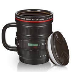 a camera lens coffee mug next to a lid