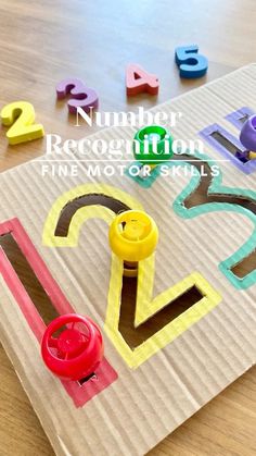 the number recognition fine motor skills are made out of cardboard