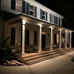 Image of building lit-up with NiteLites outdoor lighting. Copper And Brass