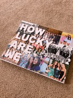 the book how lucky are we? is laying on the floor in front of a carpet