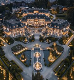 an aerial view of a mansion at night