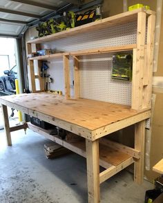 a workbench made out of wood in a garage