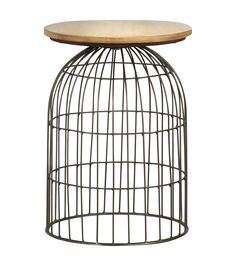 a round table with a wooden top and metal wire cage on the bottom, against a white background