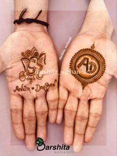 two hands with hendi designs on them, one is holding the other's hand