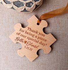 a wooden ornament that says thank you for being a piece of our special day