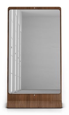 an empty wooden mirror on a white background