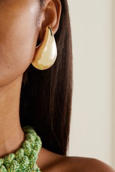 Bottega Veneta's earrings are the perfect signature every day piece. Designed in a sculptural silhouette, they're cast from gold-plated silver that elegantly hug your ear. Wear your hair pulled back to make sure they're on full display. Polished Finish Drop Earrings For Evening, Luxury Polished Drop Earrings, Evening Teardrop Earrings With Polished Finish, Polished Yellow Gold Earrings, Teardrop Earrings With Polished Finish For Evenings, Luxury Everyday Yellow Gold Polished Earrings, Everyday Luxury Yellow Gold Earrings With Polished Finish, Chic Gold-tone Jewelry With Polished Finish, Luxury Everyday Yellow Gold Earrings With Polished Finish