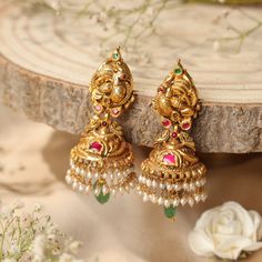 Buy Earrings Online | Mayuri Nakshi Jhumkis from Indeevari Buy Earrings Online, Mangalsutra Chain, Gold Jewellry, Gold Necklace Simple, Bride Jewelry, Fabric Necklace, Gold Bride Jewelry, Buy Earrings, Necklace Simple