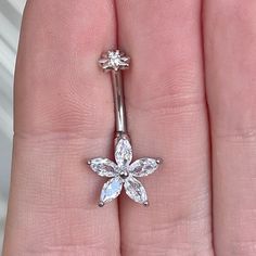 This cute flower belly button ring is made with surgical steel. A unique design, this marquise flower belly ring is a great minimalist/delicate option, very feminine and floral. Drop jaws with this body jewelry.This piece is internally threaded*Also available in silver and rose gold options. These pieces are 316L surgical steel but not 14k gold plated*Details & Size:- 316L Surgical Steel, Gold color is 14k Gold Plated- Internally threaded- Size: 10mm bar, 14G Dragon Goddess, Bellybutton Ring, Belly Button Jewelry, Daith Earrings, Goddess Jewelry, Eyebrow Piercing, Belly Jewelry, Button Rings, Belly Button Ring