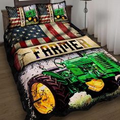 a bed with a green tractor and american flag on it