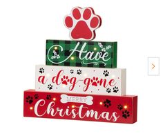 three christmas signs with the words have a dog gone and merry christmas written on them