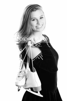 black and white photograph of a woman holding shopping bags