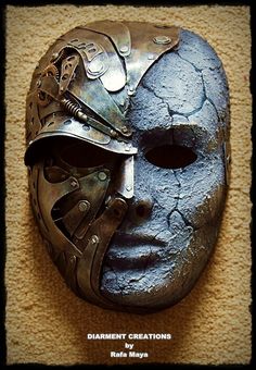 the mask is made out of metal and has holes in it