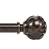 an image of a curtain rod with decorative knobs