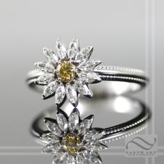 A simple and fun daisy with, this ring features natural diamonds or moissanite, as the white petals with the center stone being a yellow diamond in either case. All rings are carefully crafted using USA refined solid white gold and quality stones that will dazzle in the sun. Features: ~Solid 14k white gold ~Diamonds will be fair trade, SI-1, GH or better, Marquise cuts, 3x1.5mm each ~If moissanite is selected, I use stones of a matching grade and clarity. ~All stones are beautifully cut, eye cle Daisy Engagement Ring, Engraved Handwriting, Band Mom, White Petals, Daisy Ring, White Diamond Ring, Yellow Diamond, White Gold Diamonds, White Diamond