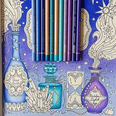 a coloring book with six different colored pencils in front of it and an image of bottles