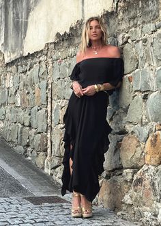 Indulge in the chic style of the Lucy Dress, featuring an off-the-shoulder design, delicate ruffled sleeves, and side seams with romantic ruffles. Modern side openings and a flowing maxi length complete the look. The double-layered body and single layered sleeves create a tantalizing contrast. Elevate your ensemble by pairing it with our Signature belts Elastic on Sleeve 100% Chiffon Lining 100% Chiffon Dry clean or Hand Wash or Delicate Cycle Wash and Hang Dry Designed with love in Miami, FL US Ruffled Maxi Length Off Shoulder Party Dress, Ruffled Maxi Length Off Shoulder Dress For Party, Fitted Off Shoulder Maxi Dress With Ruffles, Floor-length Off Shoulder Ruffle Dress For Evening, Floor-length Ruffled Off Shoulder Evening Dress, Floor-length Off Shoulder Dress With Ruffles, Elegant Off Shoulder Floor-length Dress With Ruffles, Elegant Floor-length Off Shoulder Dress With Ruffles, Elegant Off-shoulder Floor-length Dress With Ruffles