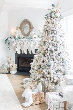 a white christmas tree in a living room