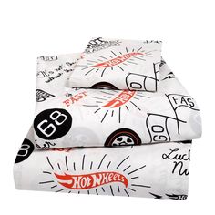 two sheets with different designs on them and one has a black and white car design