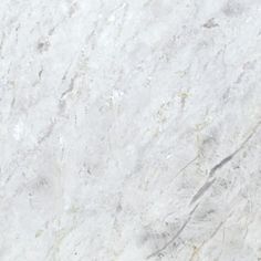 a white marble textured surface with no pattern