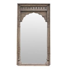 an ornate wooden mirror on a white background