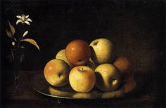 a painting of apples in a bowl on a table with a white flower behind it