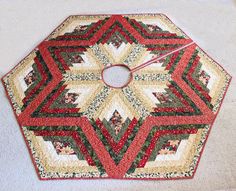 a red and white clock sitting on top of a rug