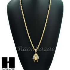 Color : GOLD Brand New Rapper Chain Freemason Pendant Size : Appx. 1.0" x 2.0" Chain : 4mm 24" Rope Chain Stone : Cubic Zirconia Stone & Sand Blast Plated : 14k Gold Plated Chain & Pendant Condition: 100% Brand New High Polish Gold Rope Chain Jewelry For Streetwear, Gold Rope Chain Jewelry, Gold Figaro Chain Jewelry For Streetwear, Gold Figaro Chain Necklace For Streetwear, Gold Plated Cuban Link Rope Chain Necklace, Gold Metal Necklaces For Streetwear, Pride Necklace, Egyptian King, Egyptian Kings