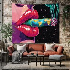 a living room with a large painting on the wall and couches in front of it