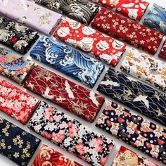 many different types of ties laid out in rows