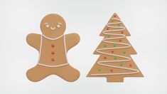 two gingerbread cookies decorated to look like christmas trees