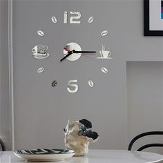 a clock that is on the wall above a table