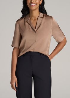 The Sophisticated Tall Women's Blouse Elegance in Every Thread Embrace elegance with our Notch Collar Satin Blouse for tall women. This hip-length, short sleeve tall women's blouse combines the luxurious feel of 100% polyester satin with a relaxed, yet sophisticated fit. The pre-washed fabric ensures shrinkage control for a consistent fit, while the self-fabric collar and button closure add a touch of class. Whether for a day at the office or a night out, this women's tall shirt is your go-to fo Elegant V-neck Shirt For Daywear, Formal Half Sleeve Tops For Summer, Semi-formal Solid Color Short Sleeve Tops, Elegant Half Sleeve Summer Shirt, Elegant Solid Color Short Sleeve Shirt, Elegant Solid Short Sleeve Shirt, Classic Half Sleeve Blouse For Work, Solid Short Sleeve Blouse For Business Casual, Classic Half Sleeve Office Blouse