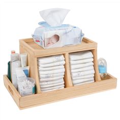 a wooden box filled with lots of diapers