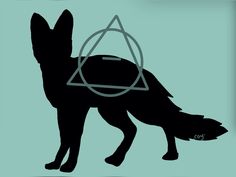 a black dog with a triangle on it's back