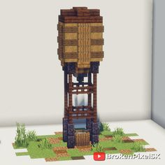 an image of a wooden tower made out of blocks