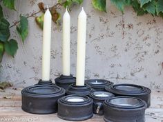 a group of candles sitting next to each other