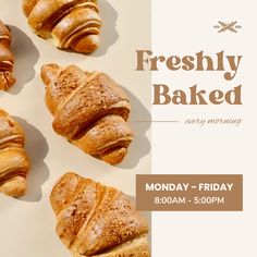 four croissants on a white surface with the words freshly baked over them