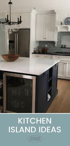 a kitchen island with wine rack in the middle and chandelier hanging from the ceiling