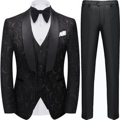 a black tuxedo suit with white shirt and bow tie