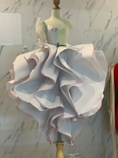 a mannequin with a dress on top of it