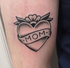 a heart tattoo with the word mom on it