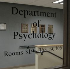 an office door with the words department of psychholy written in black on it