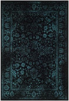 a blue rug with an ornate design on the top and bottom, in dark colors